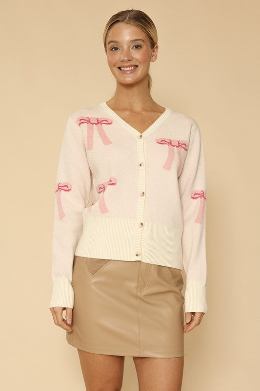 White Button Up Long Sleeve Cardigan Sweater with Pink Bow Design