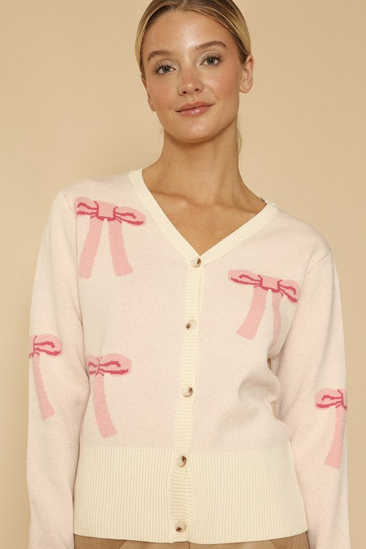 White Button Up Long Sleeve Cardigan Sweater with Pink Bow Design